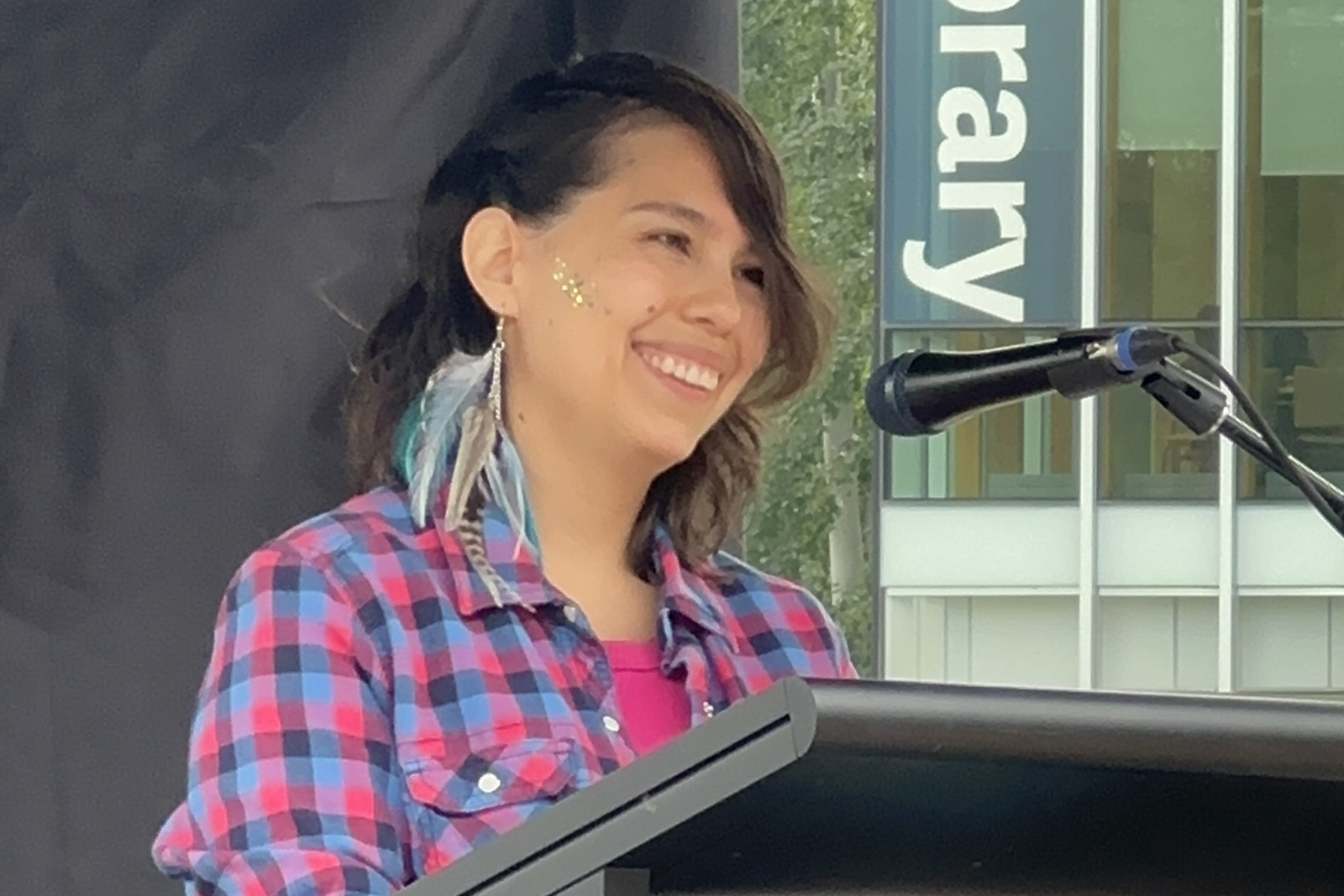 Ximena giving the TRUSU Pride speech, 2026