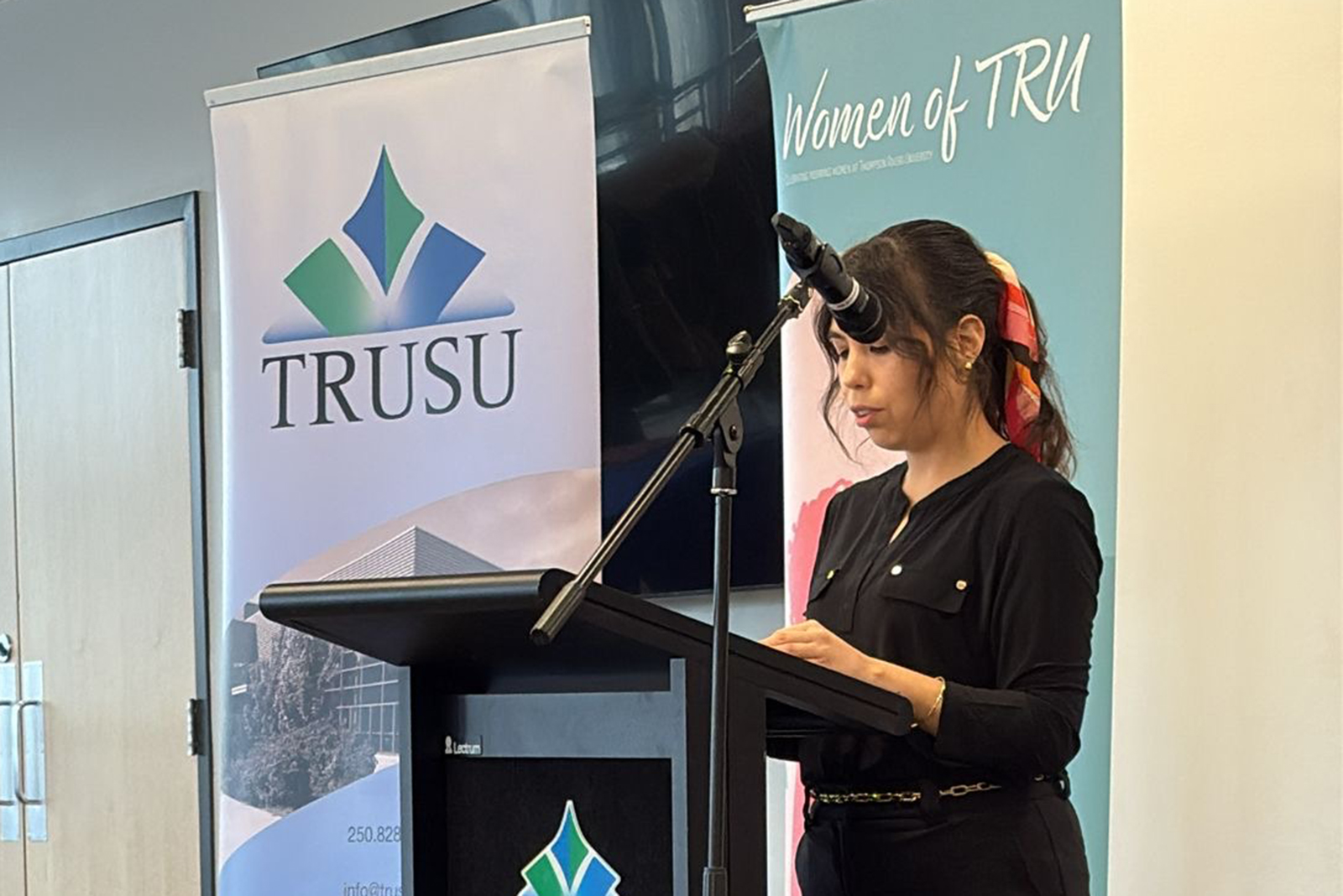 Ximena speaking at Women of TRU, 2025